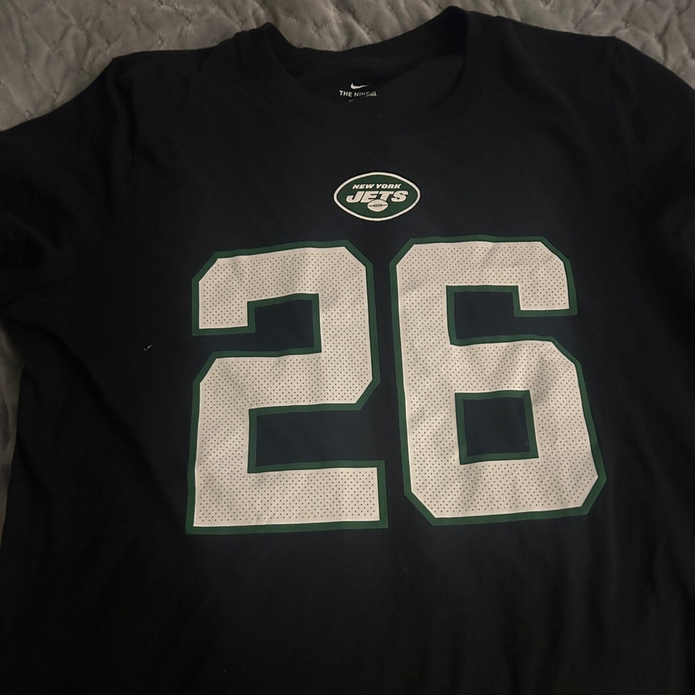 Size Large, Nike NY Jets Top. Tried it on after I got it and didn’t ever wear it